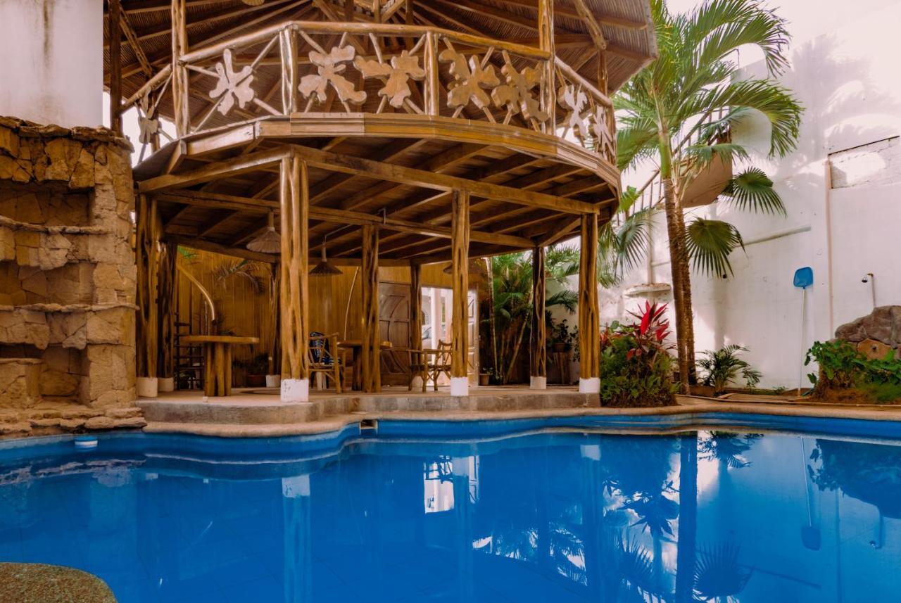 Hostal Poseidon Puerto Cayo Exterior foto